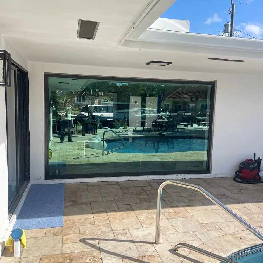 New impact picture window facing the pool