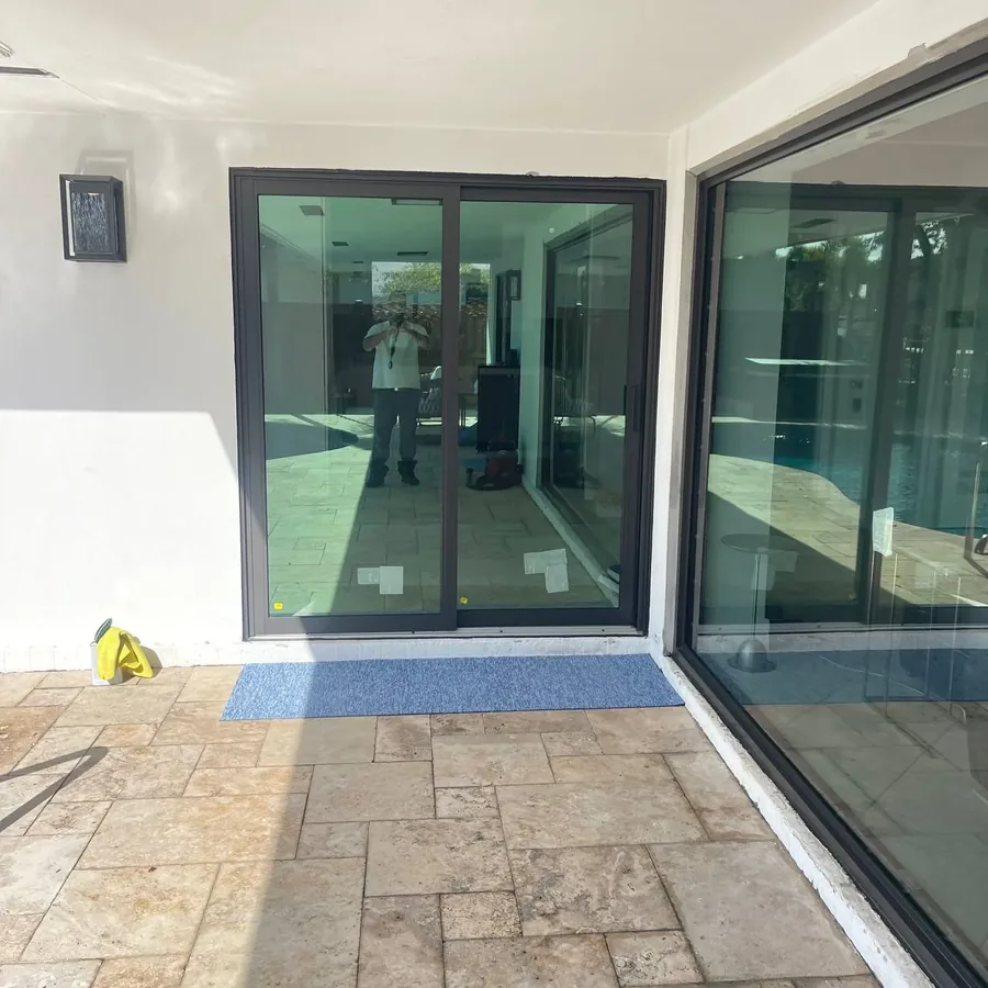New impact sliding glass door on a covered patio