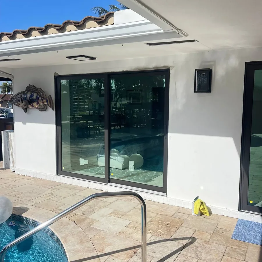 New impact sliding glass door by the pool