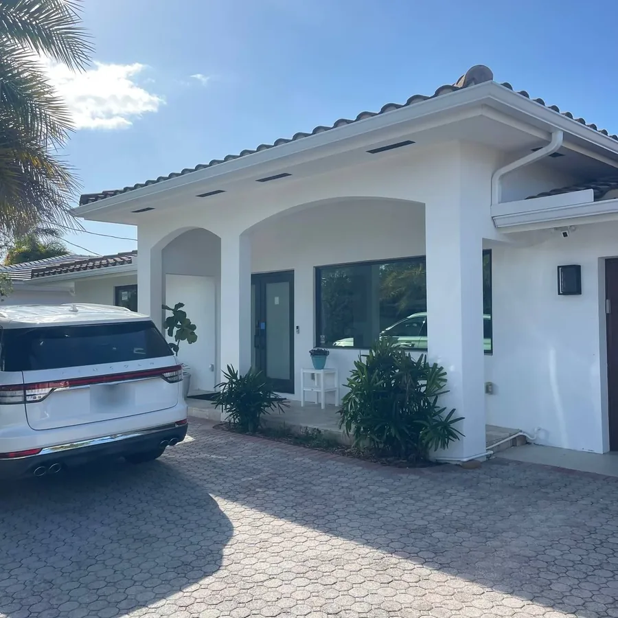 Front entry with a new impact door and window